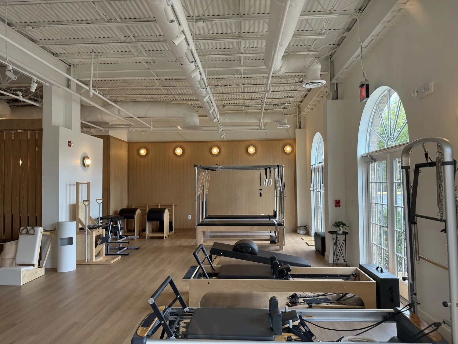 Bright Pilates studio with reformers at Great Falls Movement Center.