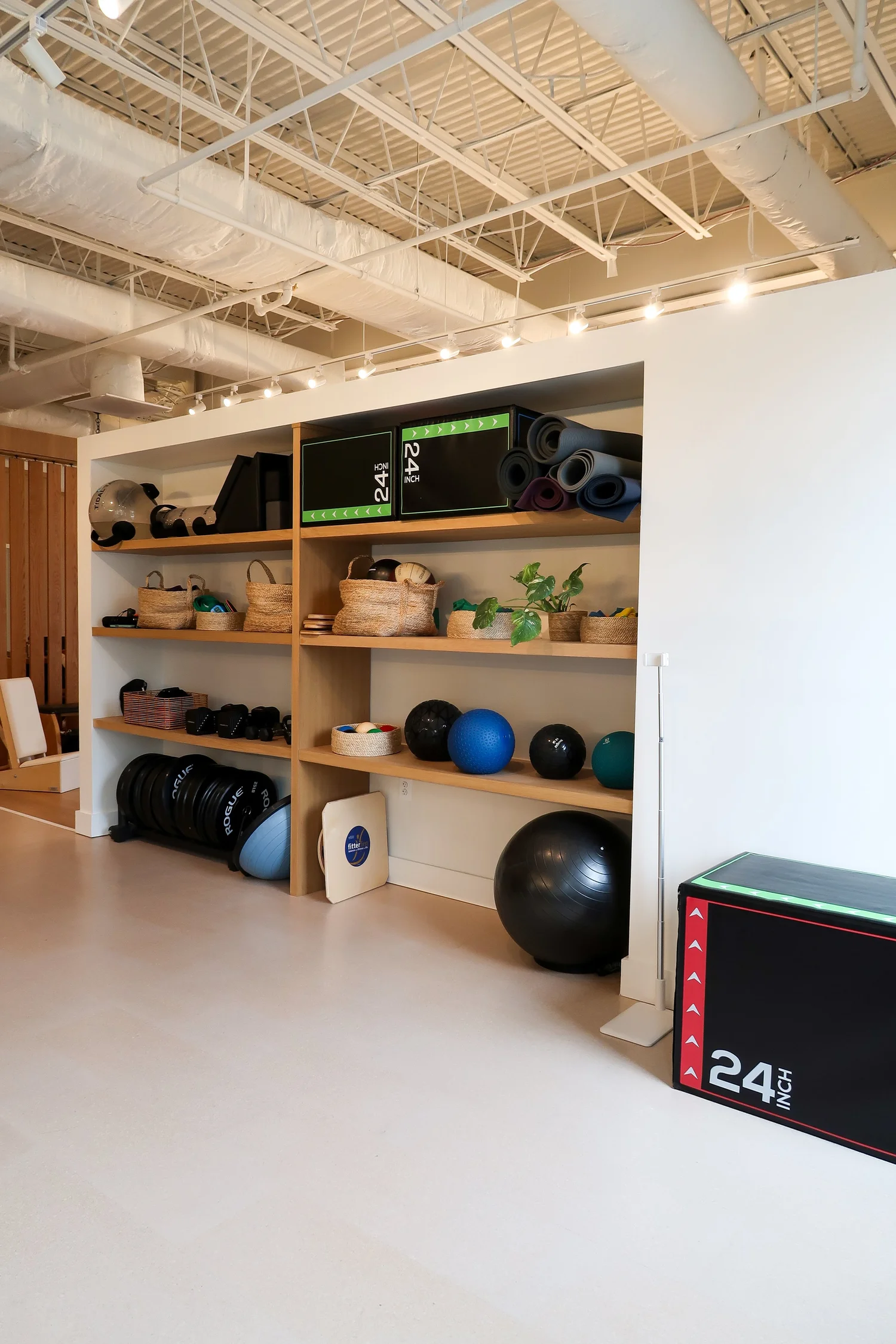Personal trainer working with a client at Great Falls Movement Center.