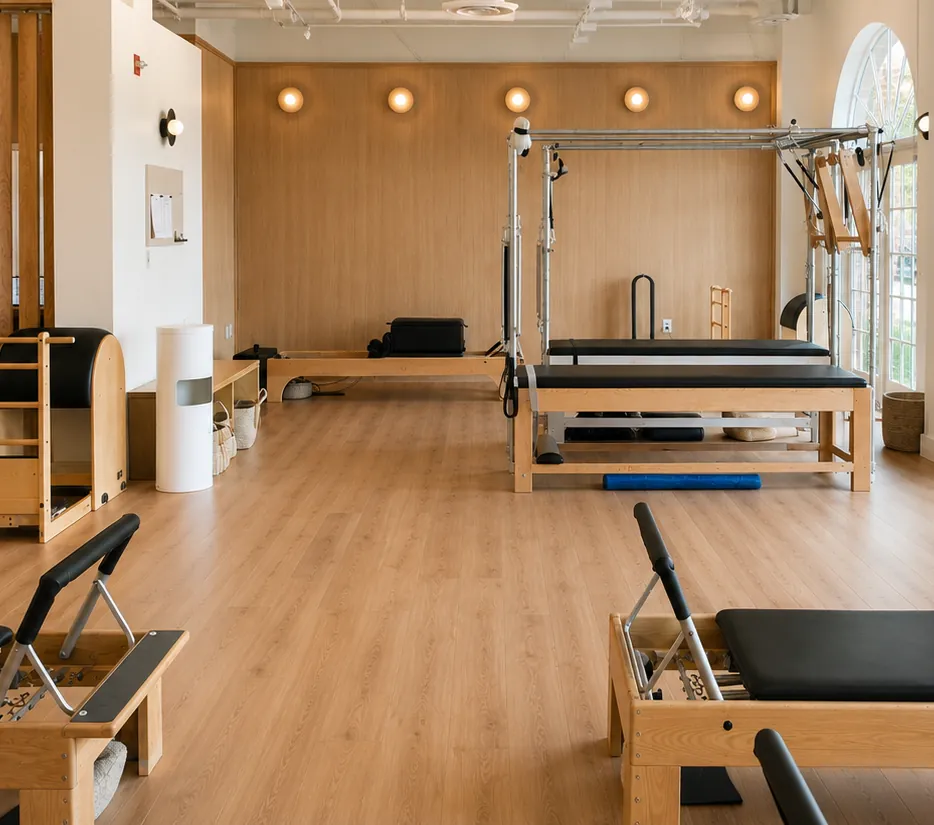 Bright Pilates studio with reformers at Great Falls Movement Center.